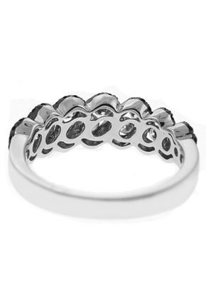 Right Hand Fashion Ring with a Swirling Design of Black Diamonds Surrounding White Diamonds Set in 18K White Gold