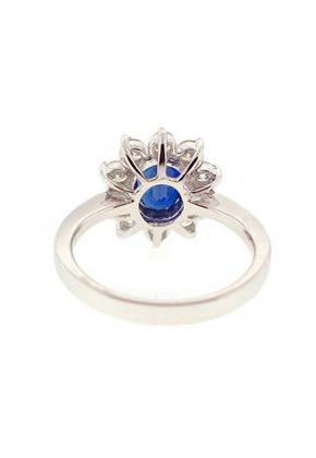 Right Hand Fashion Ring with Sapphire Center Surrounded by Prong Set Diamond Rounds in 18K White Gold