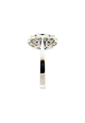 Right Hand Fashion Ring with Sapphire Center Surrounded by Prong Set Diamond Rounds in 18K White Gold