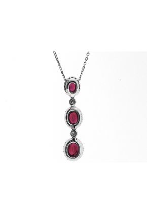 3 Stone Ruby Dangling Pendant with Diamond Halos Around Each & Bezel Set Diamonds In Between Set in 18K White Gold
