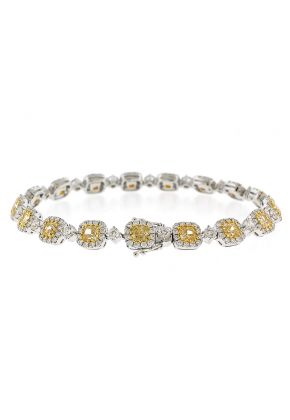 Fancy Yellow Diamond Tennis Bracelet with Halos of White Diamonds in 18k White Gold