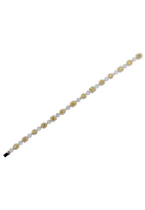 Fancy Yellow Diamond Tennis Bracelet with Halos of White Diamonds in 18k White Gold