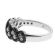 Right Hand Fashion Ring with a Swirling Design of Black Diamonds Surrounding White Diamonds Set in 18K White Gold
