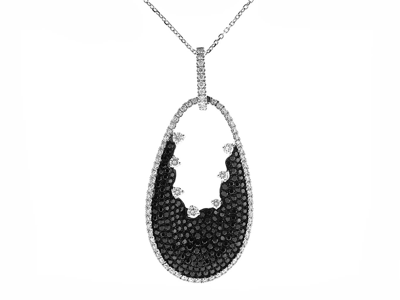 Pendant with Pavé Set Black Diamonds Bordered by White Diamonds Set in 18k White Gold