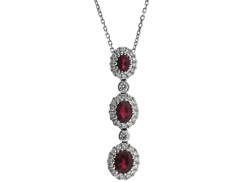 3 Stone Ruby Dangling Pendant with Diamond Halos Around Each & Bezel Set Diamonds In Between Set in 18K White Gold