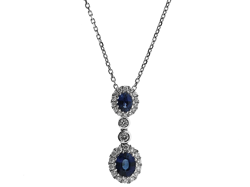 2 Stone Sapphire Pendant with Bezel Set Diamond in Between and Halos on Each Set in 18K White Gold