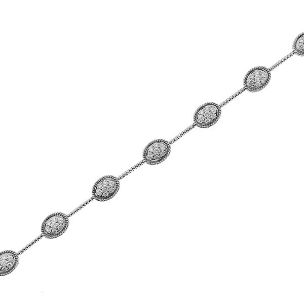 Ladies Diamond Tennis Bracelet with Oval Patterns Bordered by Rope Design in 18k White Gold