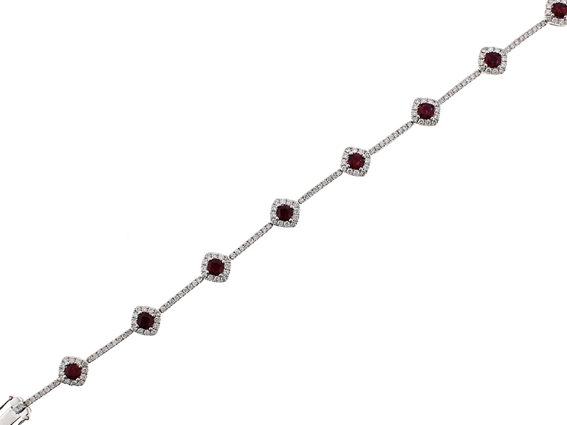 Ruby Tennis Bracelet with Halos of Diamonds in 18k White Gold