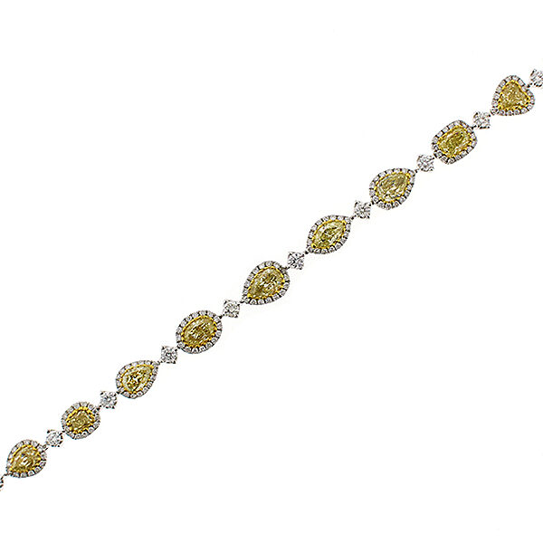 Multi Shape Bracelet with Fancy Yellow Diamonds Surrounded by Halo of White Diamonds in 18k White Gold