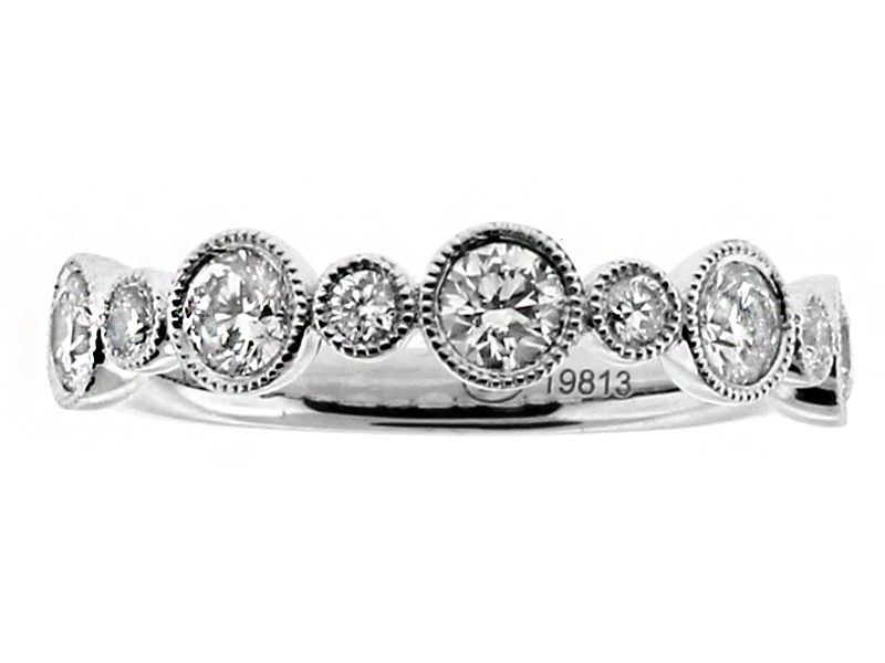 Single Row Small Large Alternating 9 Diamonds Bezel Set in 18kt White Gold