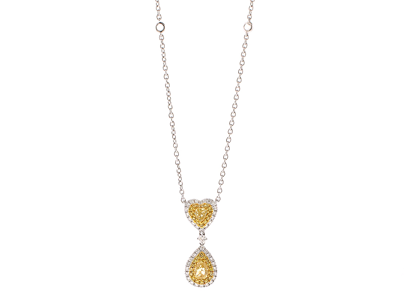 Heart and Drop Shaped Fancy Yellow Diamonds Surrounded by Halos of White Diamonds in an 18k White Gold Necklace