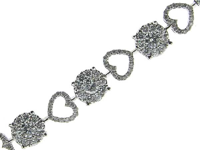 Ladies Bracelet with Cluster and Heart Designs of Diamonds in 18k White Gold