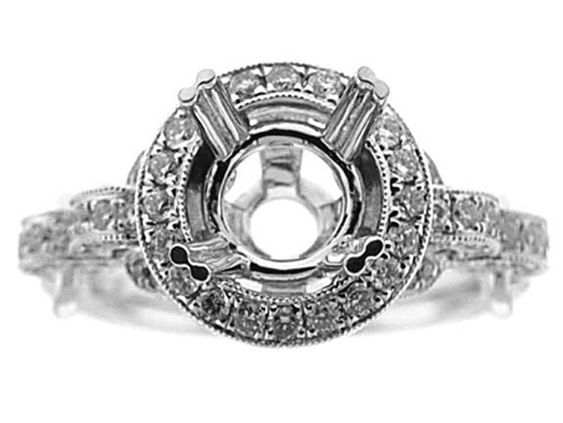 Semi-Mount Crossover Twist Shank Engagement Ring with a Round Halo and Diamonds Set in 18k White Gold