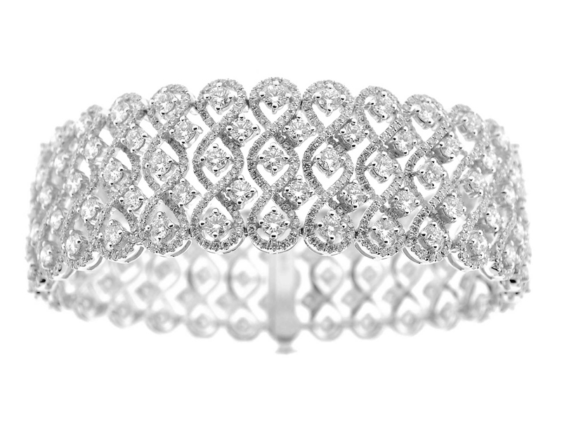 Bracelet with Prong Set Diamonds Amidst a Braided Design in 18k White Gold