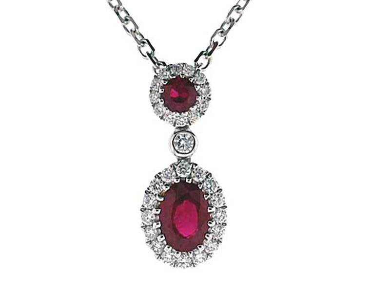 2 Stone Ruby Pendant with Bezel Set Diamond in Between and Halos on Each Set in 18K White Gold